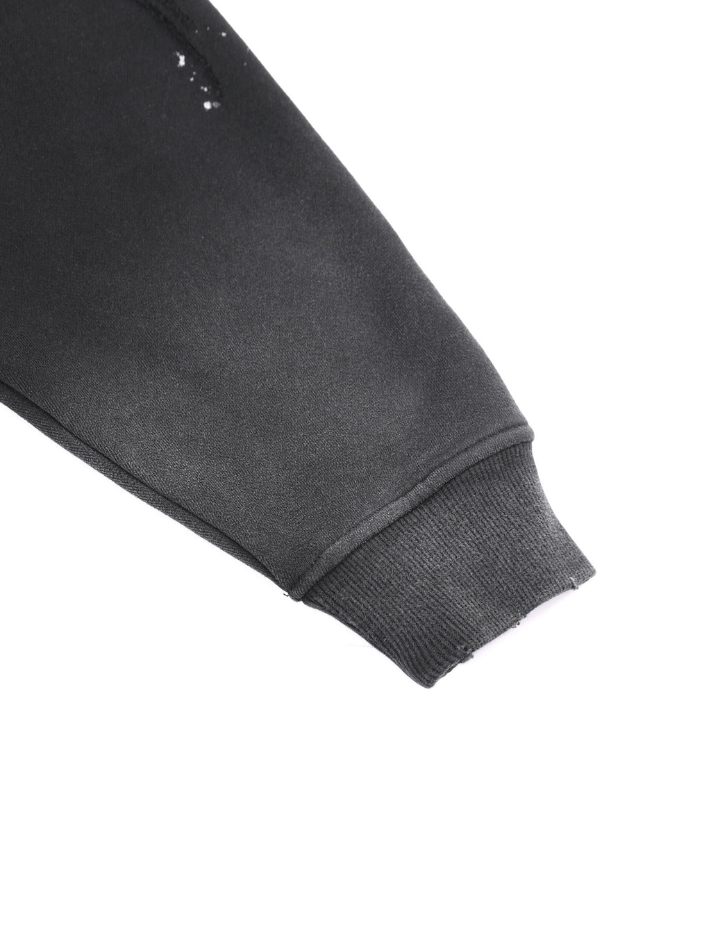 Close-up of the ribbed cuff on the vintage-wash hoodie