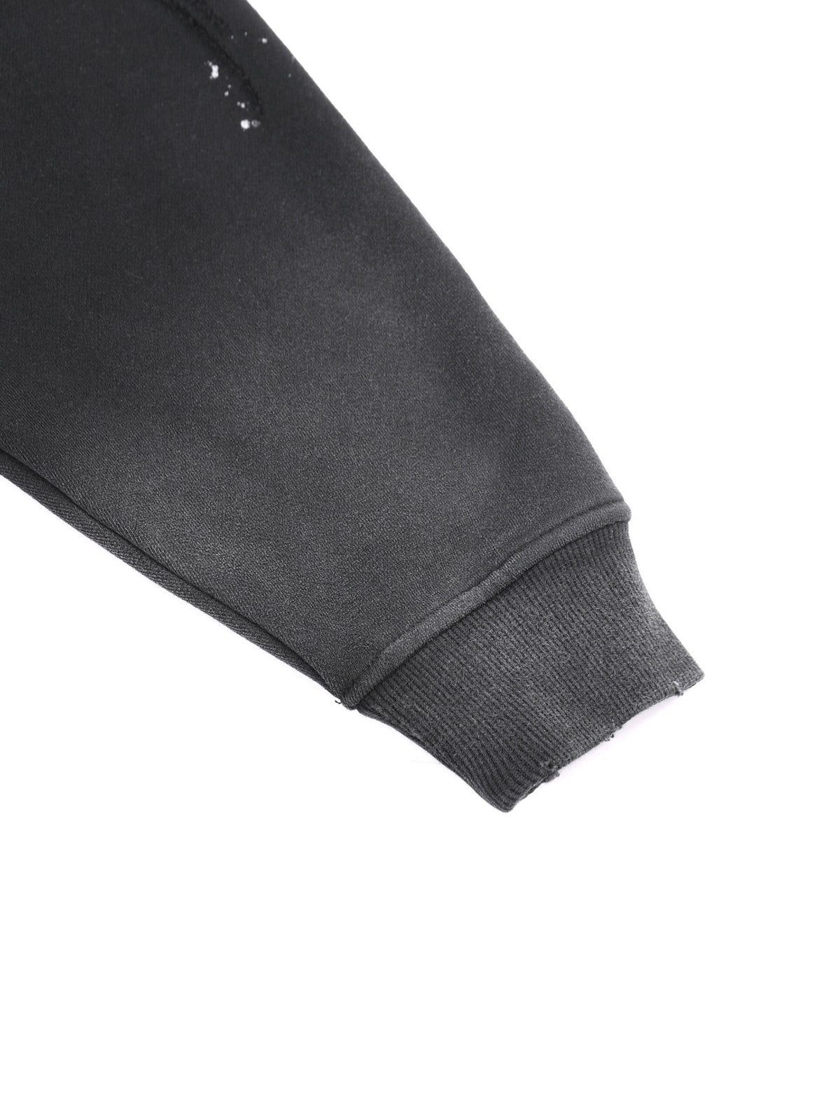 Close-up of the ribbed cuff on the vintage-wash hoodie