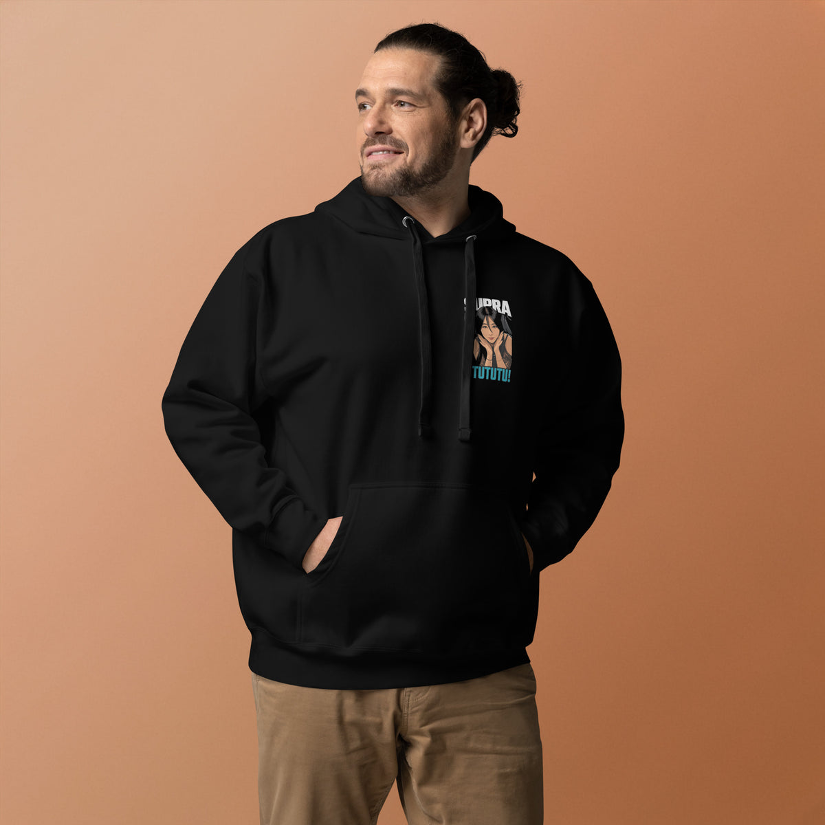 Man wearing the black Japan supercar hoodie against an orange backdrop