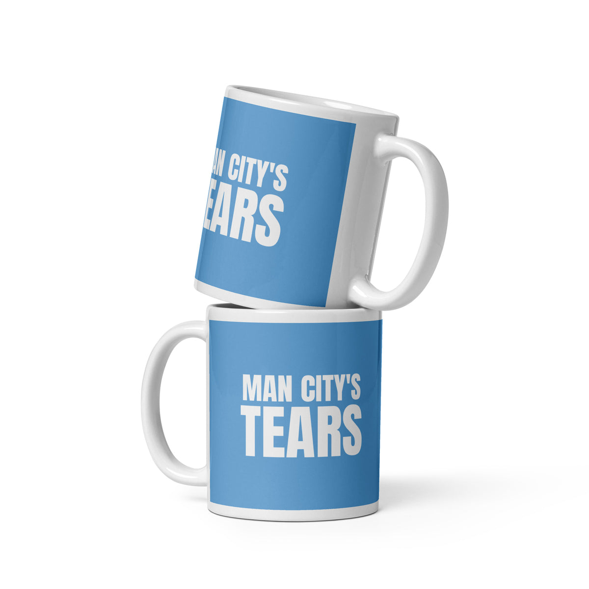 Two white ceramic mugs printed sky blue with MAN CITY'S TEARS