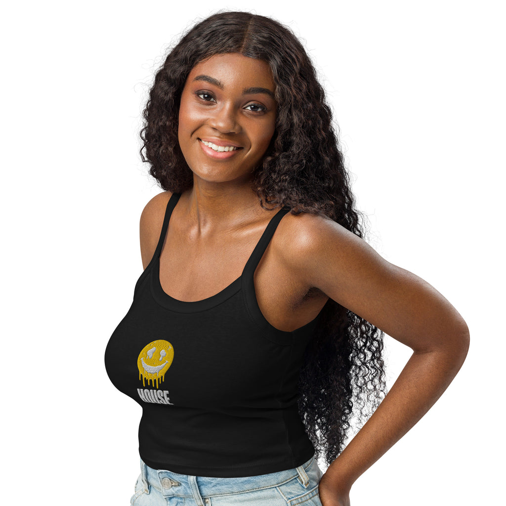 Model smiling in the black micro-rib tank top